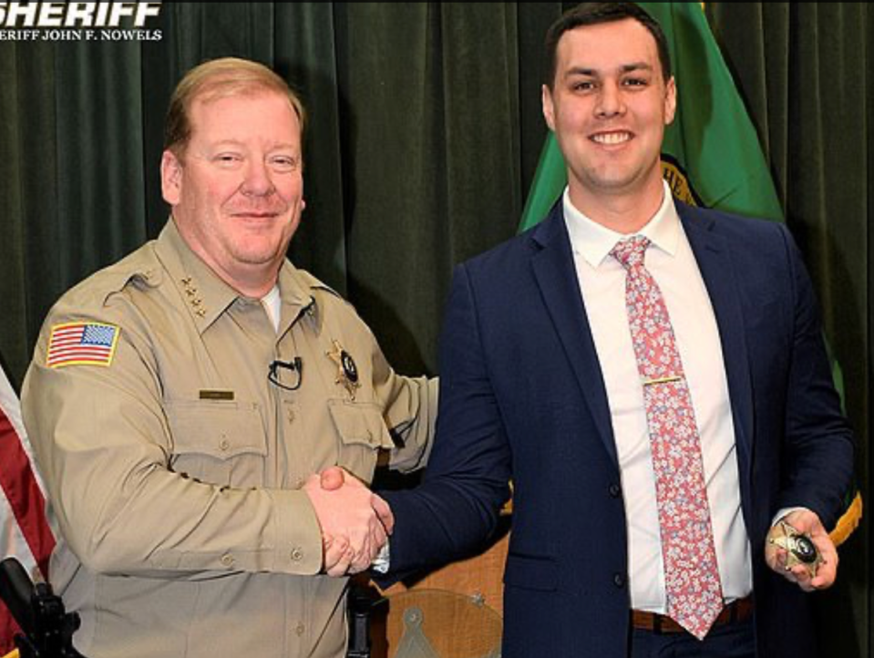 Spokane County Sheriff John Nowels, left, with deputy Brittan Morgan (Spokane County)