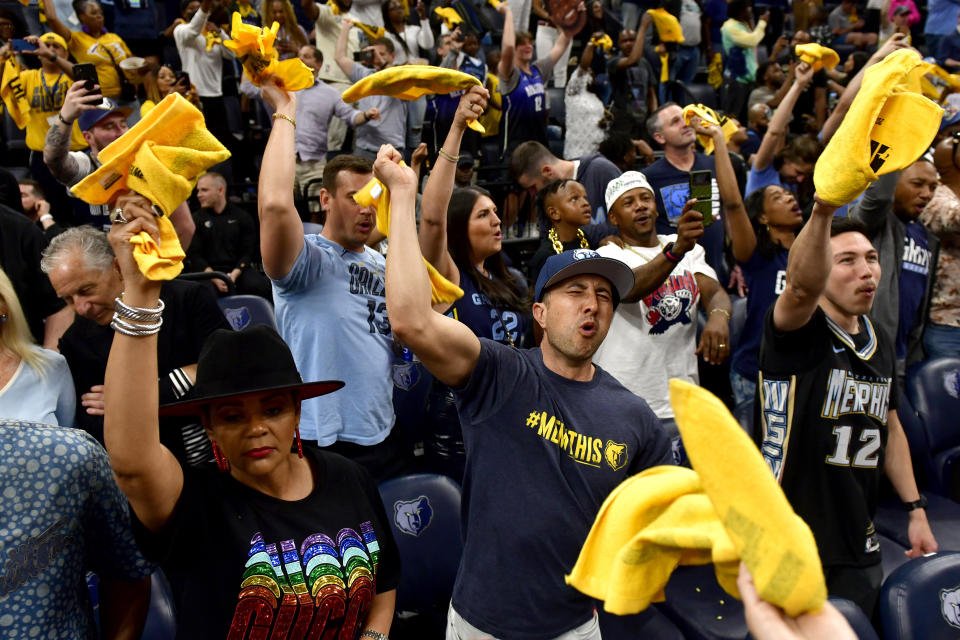 Memphis Grizzlies fans wave towels during the second half of Game 2 in a first-round NBA basketball playoff series between the Grizzlies and the Los Angeles Lakers Wednesday, April 19, 2023, in Memphis, Tenn. (AP Photo/Brandon Dill)