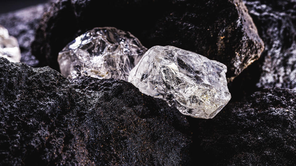 Rough diamond, precious stone in mine.