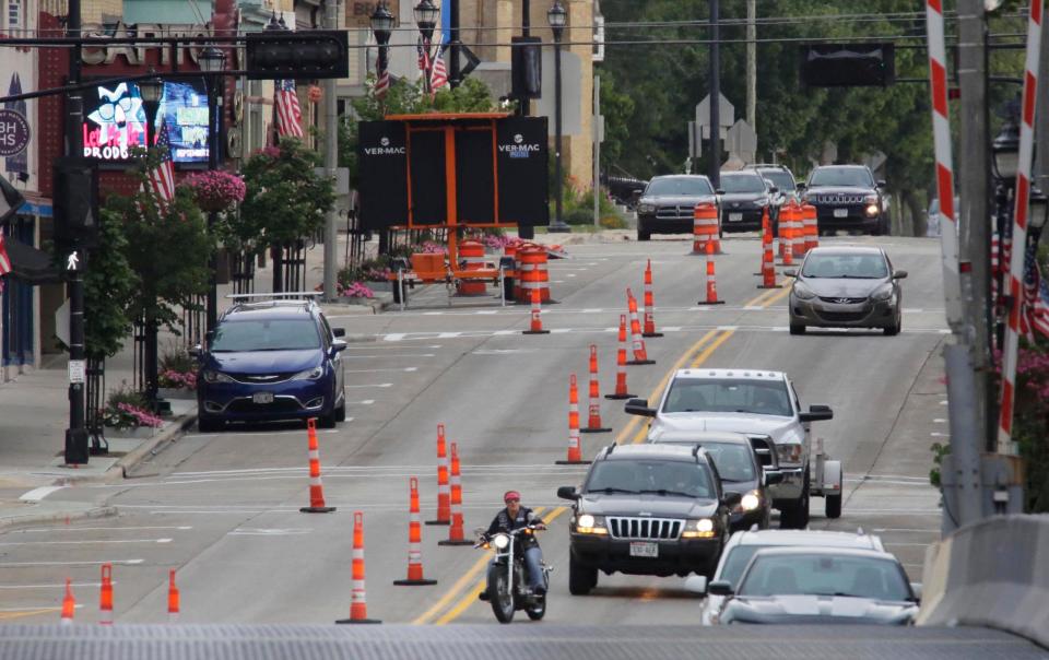 Traffic cones restrict traffic on Eighth Street  in Manitowoc. The street and 10th Street have been converted to two-way traffic.