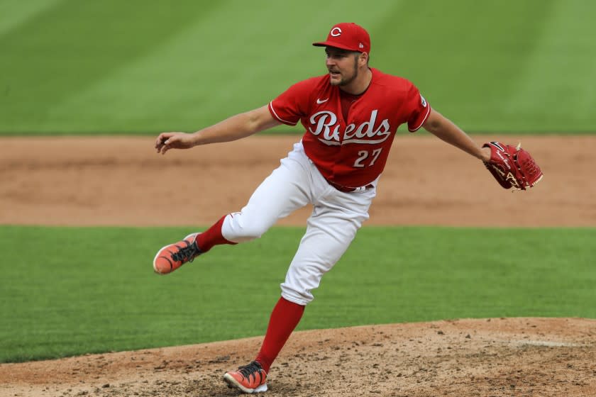 Cincinnati Reds' Trevor Bauer throws during a baseball game against the Pittsburgh Pirates.