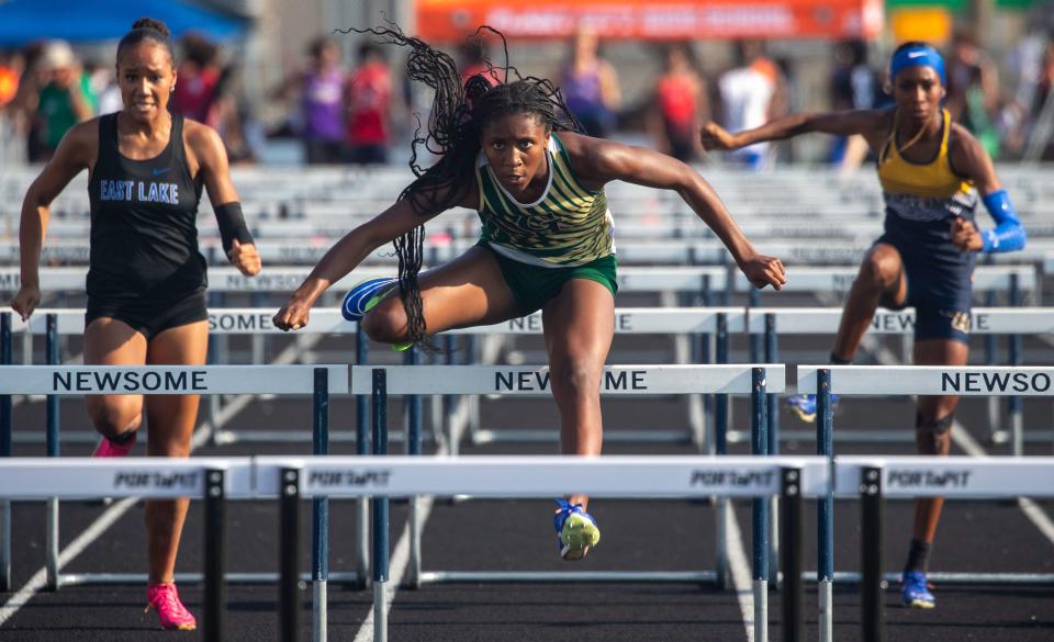 George Jenkins' Chelsi Williams competes in the 100 hurdles on Wednesday at the Class 4A, Region 2 track and field meet at Plant City High School.