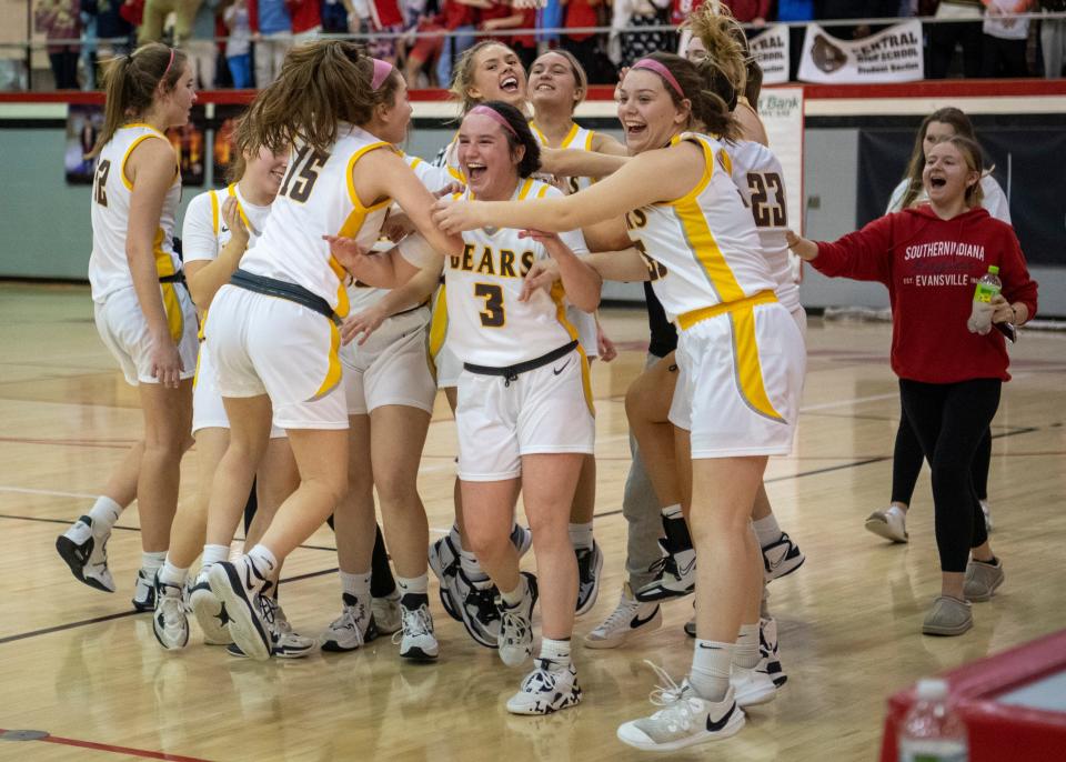 The Central Bears celebrate their victory over the North Huskies in the semifinal round of the 2023 IHSAA Class 4A Girls Basketball Sectional at Harrison High School in Evansville, Ind., Friday, Feb. 3, 2023. 