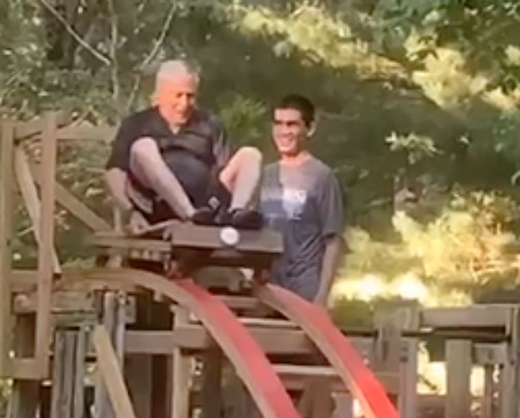 Dr. Fred Silverblatt rides the backyard roller coaster constructed by his grandson, Elliot Ryan. (Photo: Elliot Ryan)
