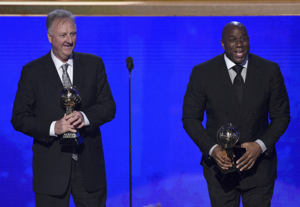 Larry Bird, left, and Magic Johnson accept lifetime achievement awards at the NBA Awards on Monday, June 24, 2019, at the Barker Hangar in Santa Monica, Calif. (Photo by Richard Shotwell/Invision/AP)