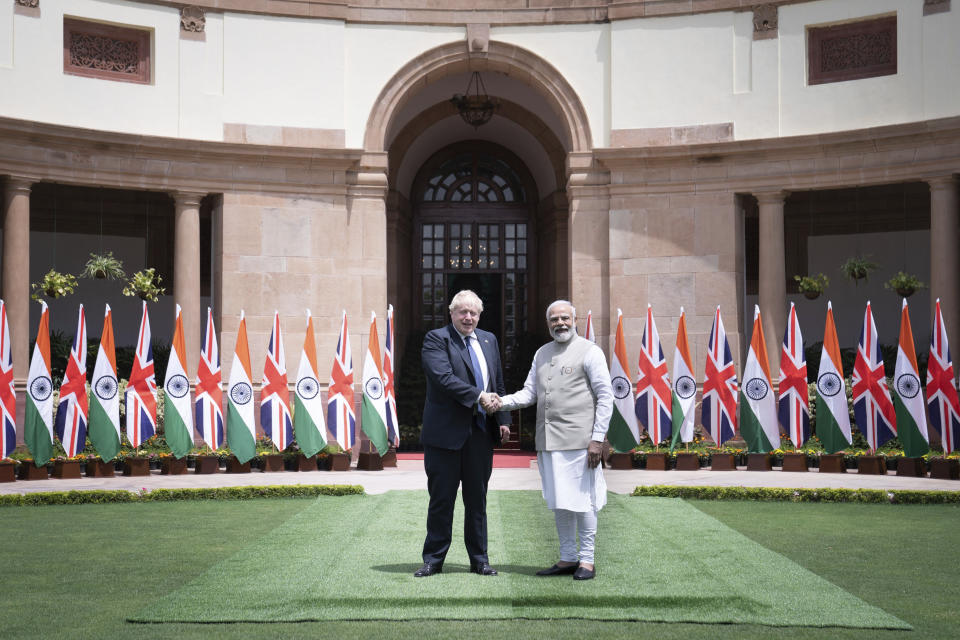 Britain's Prime Minister Boris Johnson with Prime Minister of India Narendra Modi at Hyderabad House in Delhi, as part of his two day trip to India, Friday, April 22, 2022. (Stefan Rousseau/Pool Photo via AP)