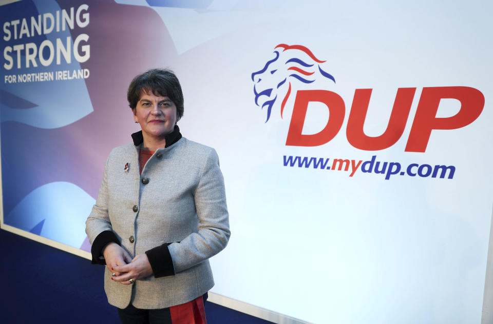 Democratic Unionist Party leader Arlene Foster poses on stage as she prepares for the the DUP annual party conference over the coming weekend in Belfast, Northern Ireland, Friday Oct. 25, 2019. Brexit dominates all political discussions at this time, as European Union ambassadors agreed Friday that the bloc should grant Britain’s request for another extension to the Brexit deadline but have not yet figured out how long that delay should be.(Brian Lawless/PA via AP)