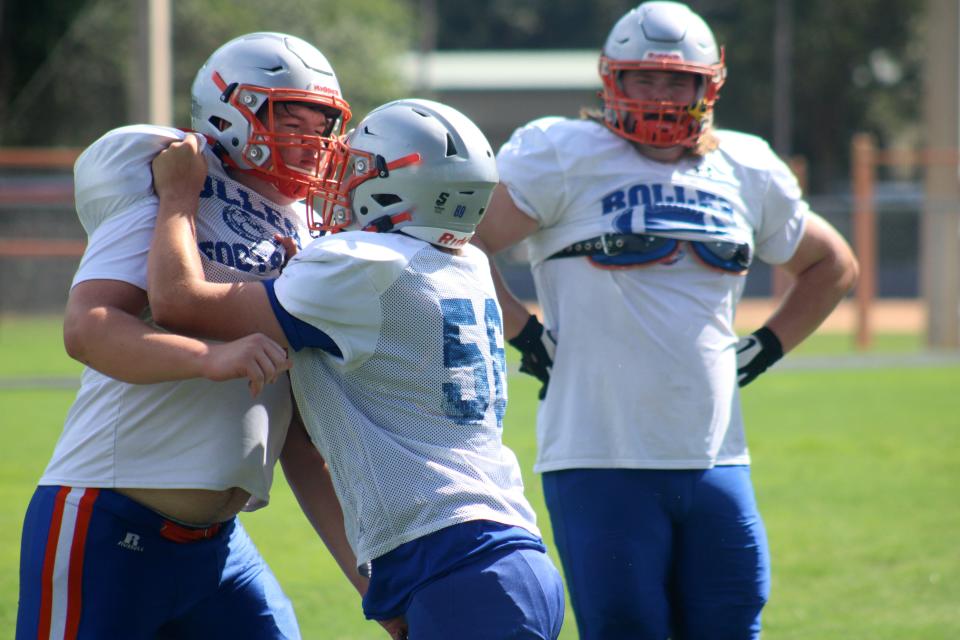 Bolles School linemen face off in blocking drills  at high school football practice on August 15, 2022. [Clayton Freeman/Florida Times-Union]