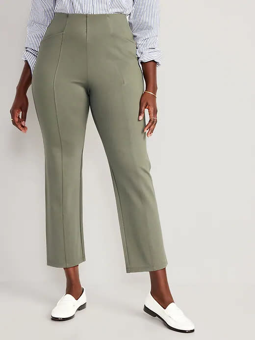 model wears green Extra High-Waisted Stevie Straight Taper Ankle Pants