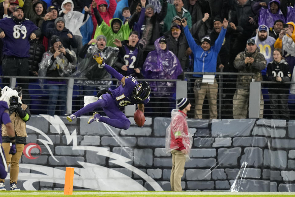 Baltimore Ravens punt returner Tylan Wallace celebrates his game-winning punt return for a touchdown against the Los Angeles Rams during overtime of an NFL football game Sunday, Dec. 10, 2023, in Baltimore. The Ravens won 37-31. (AP Photo/Alex Brandon)