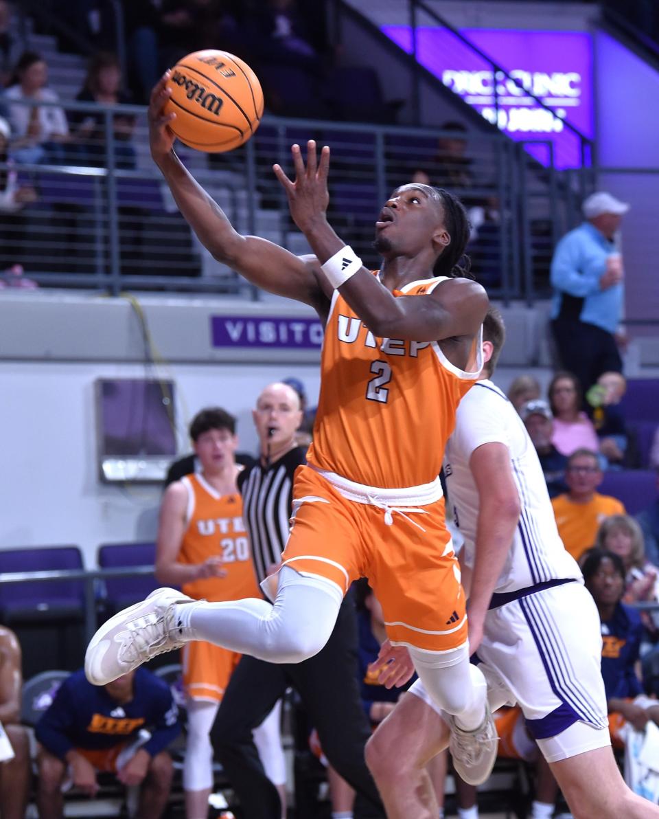 UTEP's Tae Hardy drives to the basket against the ACU defense in the second half. ACU beat the Miners 88-82 in the non-conference game Sunday, Dec. 17, 2023 at Moody Coliseum in Abilene.