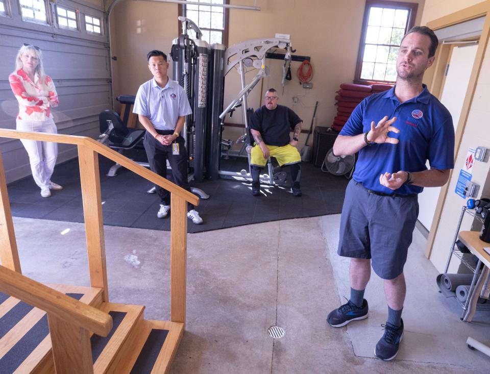 Brandon Pollock, director of exercise physiology, talks about one of the gyms veterans and first responders can use at Pegasus Farm-run Military and First Responders Center near Louisville.