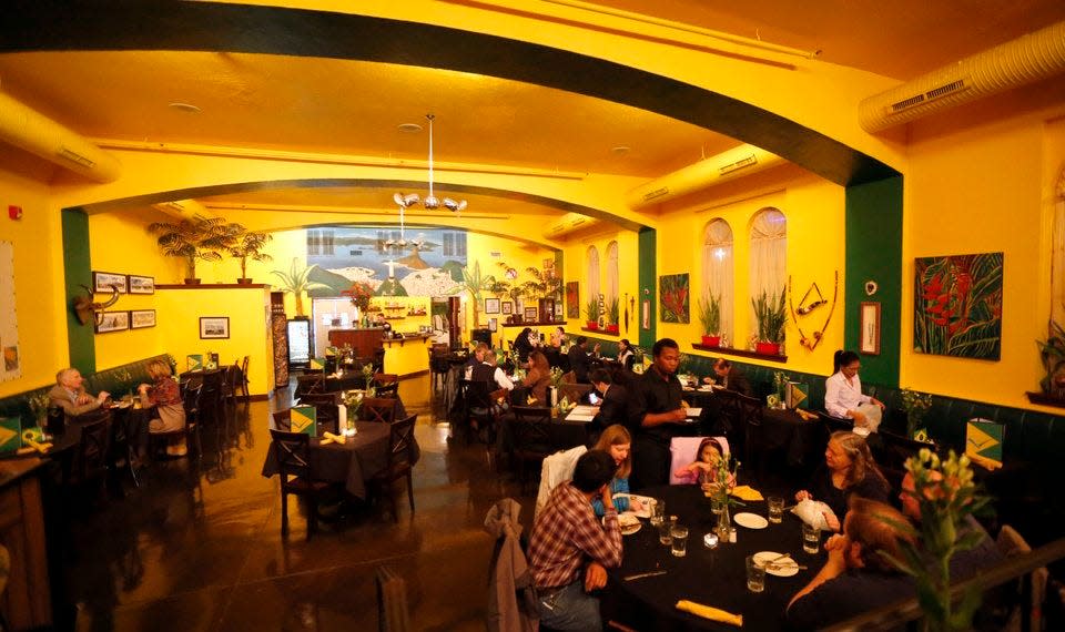 Diners eat Nov. 17, 2015, at Cafe do Brasil in Oklahoma City. The Midtown staple closed in April.