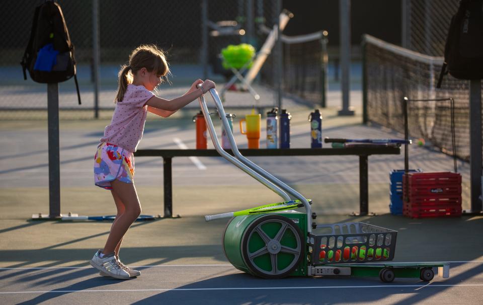 Jul 19, 2023; Mesa, AZ, USA; Izzy Crocket participates in a tennis junior class at Gene Autry Park in Mesa on Wednesday, July 19, 2023.