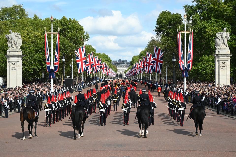 The procession moves along the Mall (Getty Images)