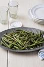 <p>Add some earthy flavor to your green beans with sesame oil and soy sauce. </p><p>Get the <strong><a href="https://www.womansday.com/food-recipes/food-drinks/recipes/a39364/skillet-green-beans-recipe-clx1113/" rel="nofollow noopener" target="_blank" data-ylk="slk:Skillet Green Beans recipe;elm:context_link;itc:0;sec:content-canvas" class="link ">Skillet Green Beans recipe</a></strong>.</p><p><a class="link " href="https://www.amazon.com/Kikkoman-Soy-Sauce-10-oz/dp/B0002YB3YG?tag=syn-yahoo-20&ascsubtag=%5Bartid%7C10070.g.2641%5Bsrc%7Cyahoo-us" rel="nofollow noopener" target="_blank" data-ylk="slk:Shop Soy Sauce;elm:context_link;itc:0;sec:content-canvas">Shop Soy Sauce</a><br></p>