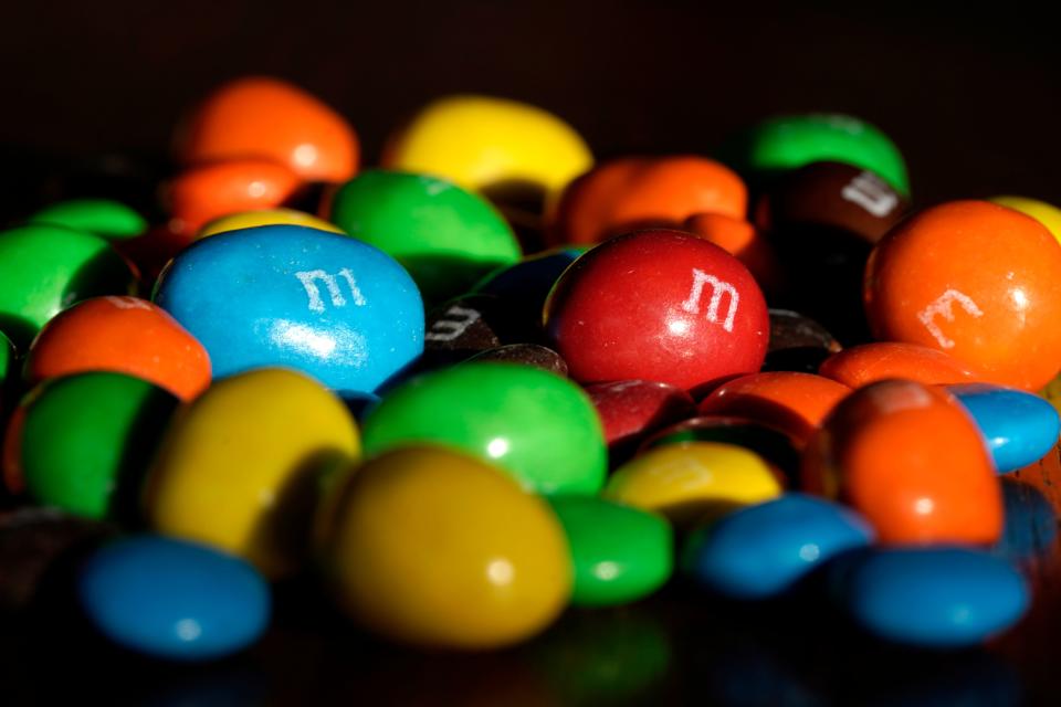 M&M's candy is seen in Overland Park, Kan., Friday, Jan. 21, 2022. Candy maker Mars is giving a makeover to its six M&M's characters as a way to promote inclusivity. ( (AP Photo/Charlie Riedel)