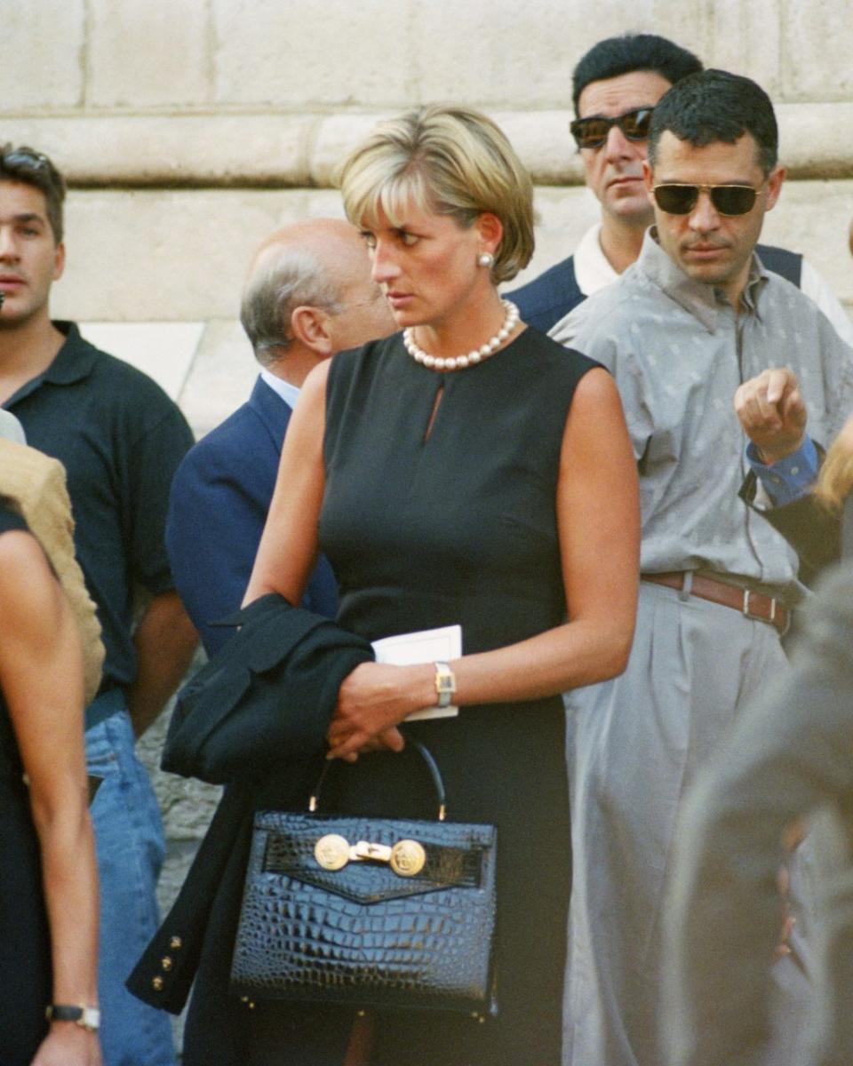 A Versace bag by her friend Gianni, who said of Diana in 1997, “It is a moment in her life, I think, when she’s found herself – the way she wants to live.” ALBERTO PIZZOLI
