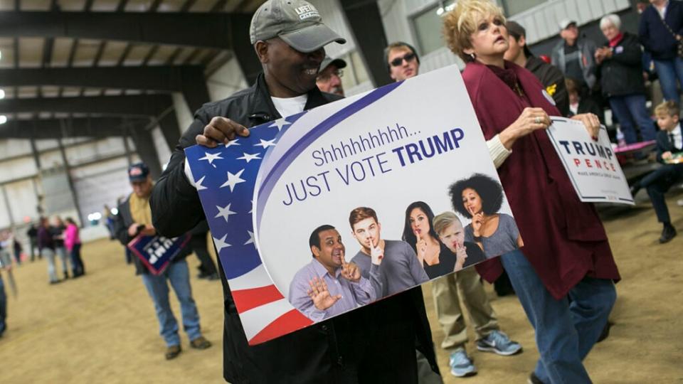 A man holds a sign as he waits to see Republican presidential nominee Donald Trump speak on October 27, 2016 in Springfield, Ohio. Trump spent the day campaigning in Ohio. With less than two weeks to go until election day, Donald Trump continues to campaign in tight battleground states. (Photo by Maddie McGarvey/Getty Images)