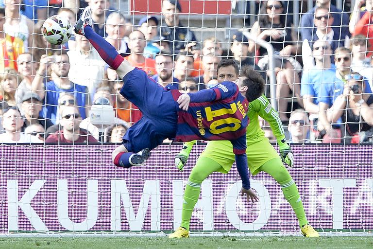 Barcelona's Argentinian forward Lionel Messi kicks a ball during their Spanish league football match FC against Valencia CF at the Camp Nou stadium in Barcelona on April 18, 2015