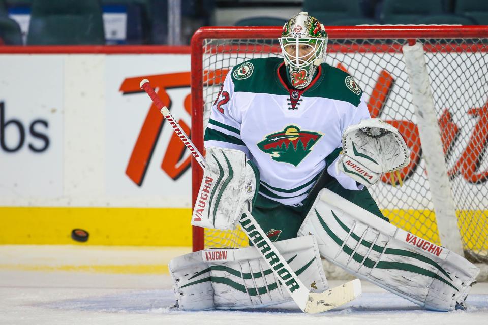 Jan 29, 2015; Calgary, Alberta, CAN; Minnesota Wild goalie Niklas Backstrom (32) guards his net during the warmup period against the Calgary Flames at Scotiabank Saddledome. Minnesota Wild won 1-0. Mandatory Credit: Sergei Belski-USA TODAY Sports