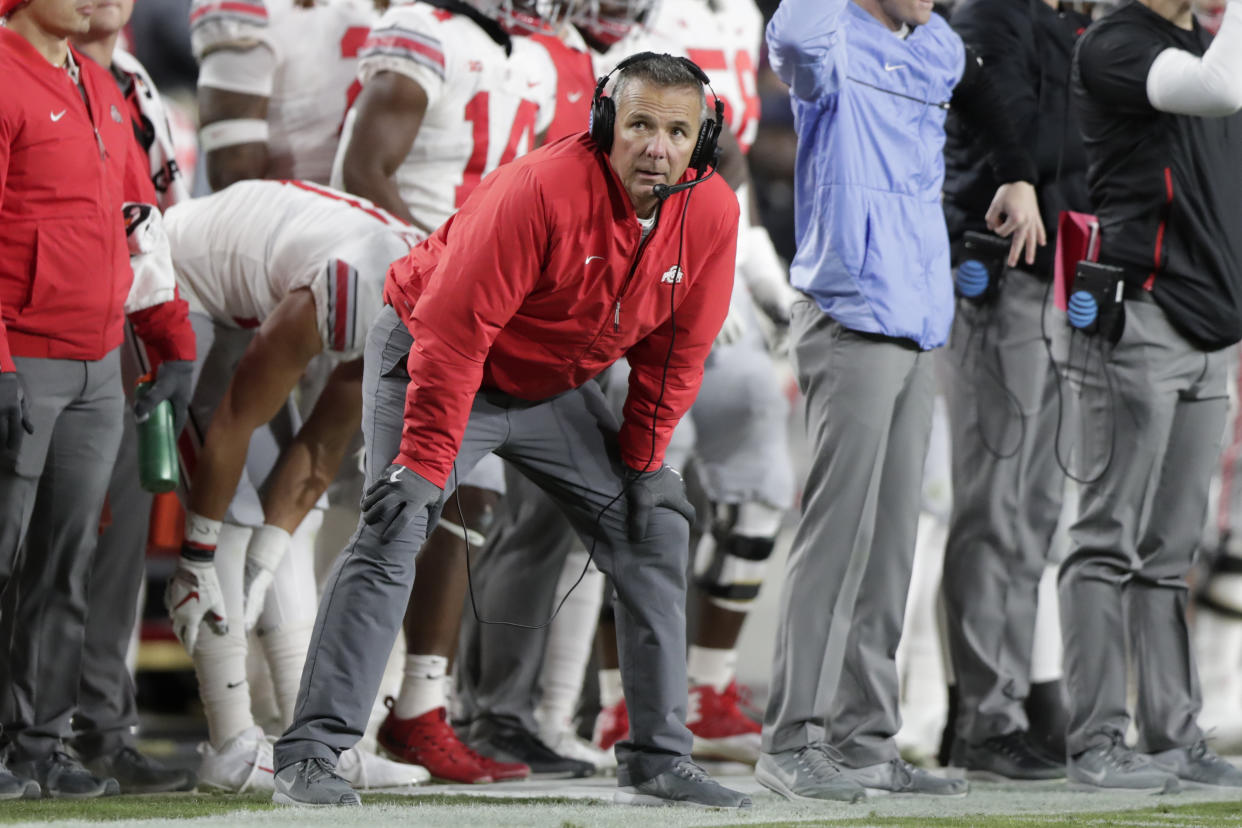 Urban Meyer watches during the first half of Ohio State’s loss to Purdue. (AP)