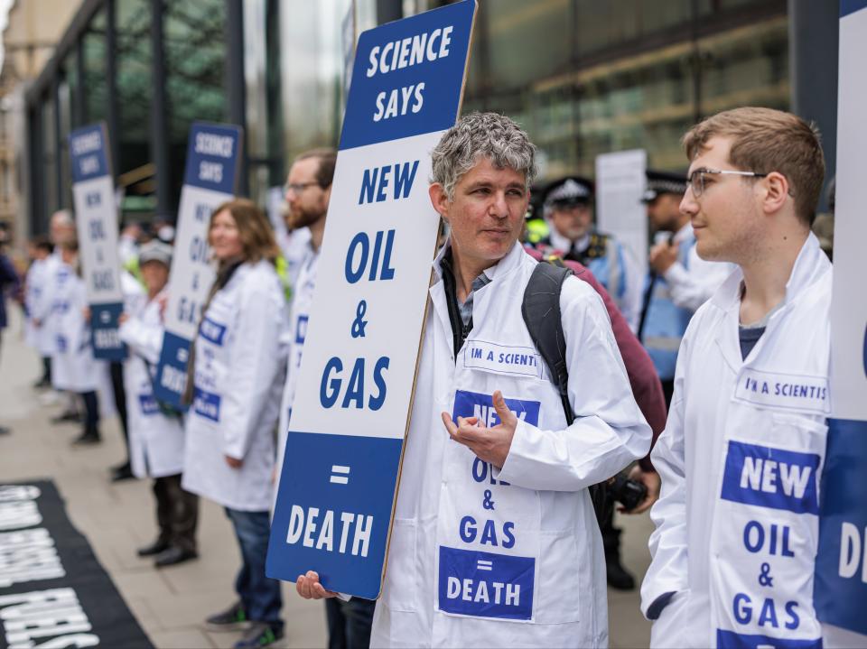 Extinction Rebellion activists protesting outside the Department for Business, Energy, and Industrial Strategy (Getty Images)