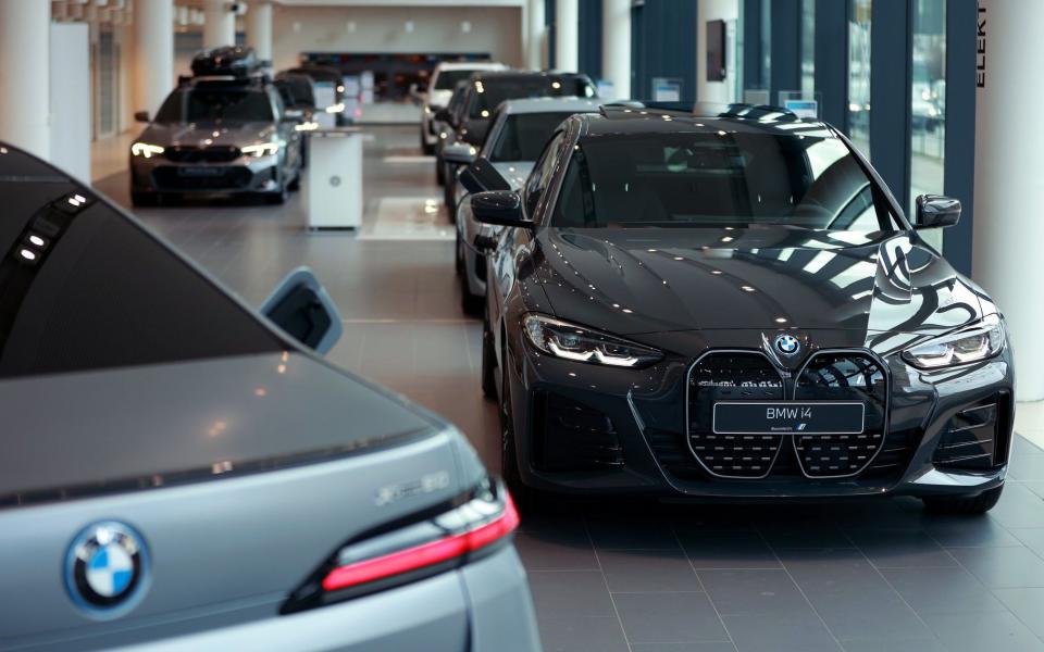 A BMW i4 electric automobile on display at a BMW AG showroom in Berlin, Germany - Krisztian Bocsi/Bloomberg