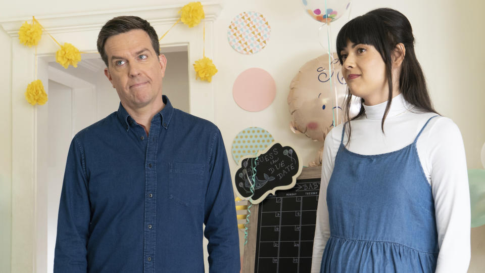 This image released by Bleecker Street shows Ed Helms, left, and Patti Harrison in a scene from "Together Together." (Tiffany Roohani/Bleecker Street via AP)