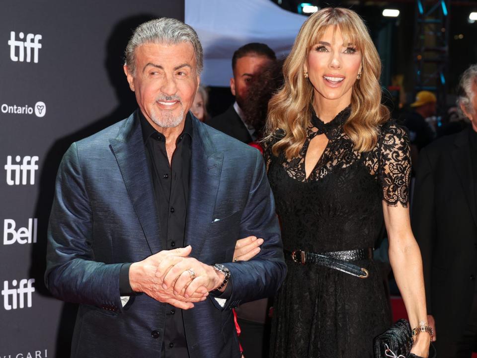 Sylvester Stallone and Jennifer Flavin in black outfits for "Sly" premiere