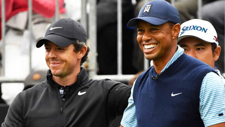 Rory McIlory (pictured left) sharing a laugh with Tiger Woods (pictured right).