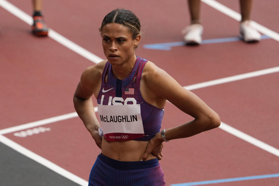 Sydney Mclaughlin, of United States, wins a heat in the women's 400-meter hurdles at the 2020 Summer Olympics, Saturday, July 31, 2021, in Tokyo. (AP Photo/Charlie Riedel)