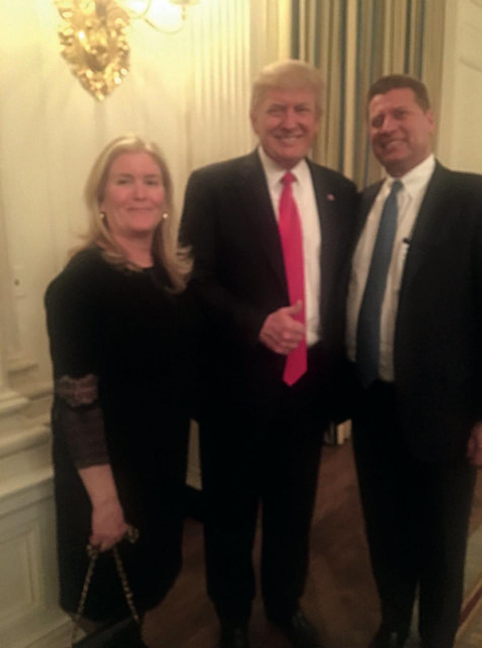 Fred and his wife, Lisa, pose with Uncle Donald at a 2017 dinner; the son of the 45th president’s late older brother, Fred grew up observing Donald before the businessman became the branded cultural behemoth, reality star and politician that he is today (Courtesy of Fred Trump)