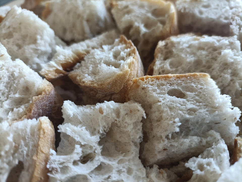 Close-up of pieces of rustic bread