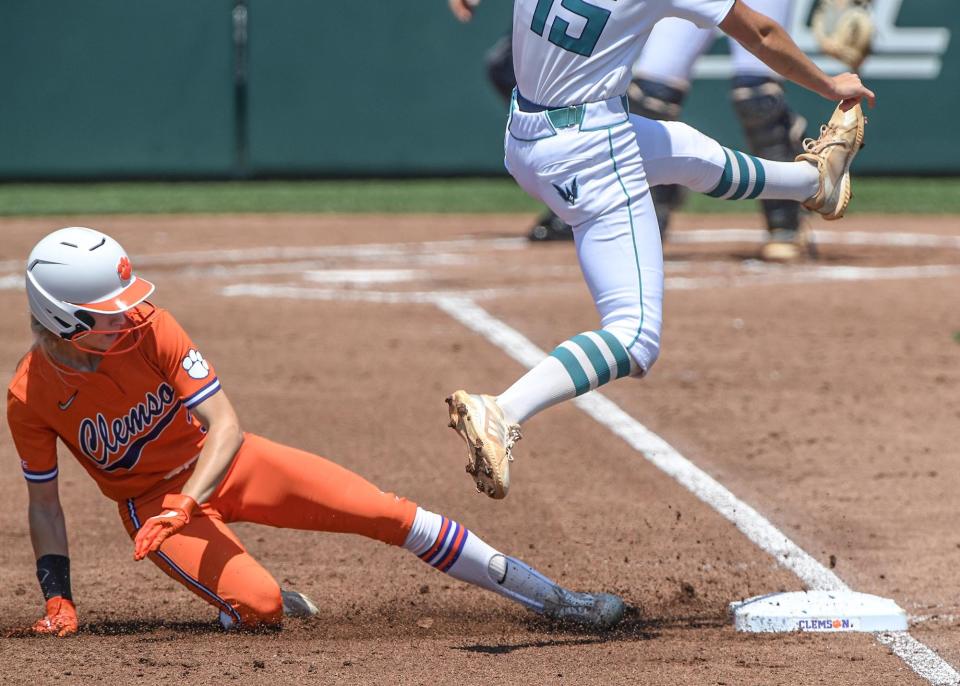 Clemson graduate Sam Russ (3) steals third base against UNC Wilmington during the NCAA Clemson Softball Regional at McWhorter Stadium in Clemson Friday, May 20, 2022. Russ, who's now a graduate student at Clemson, will serve as an advisor for the NIL collective Dear Old Clemson.