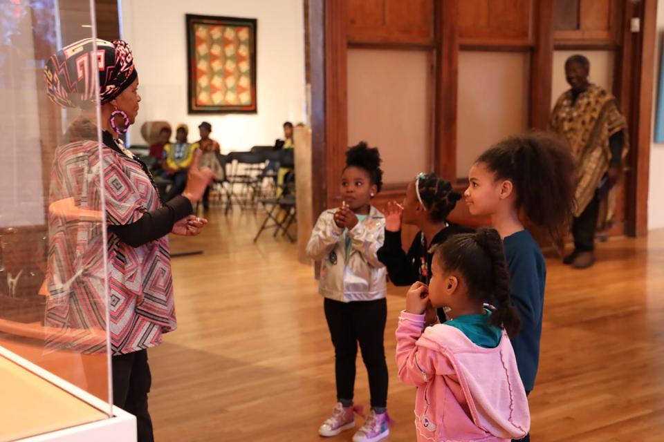 Children learn about Kwanzaa during the 2019 celebration at the Beach Institute African-American Cultural Center.