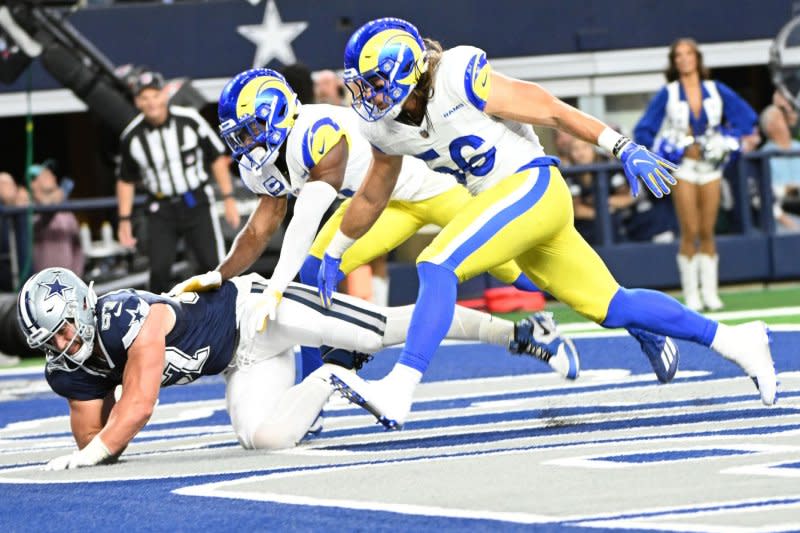 Dallas Cowboys tight end Jake Ferguson (L) scores an 18-yard touchdown against the Los Angeles Rams on Sunday at AT&T Stadium in Arlington, Texas. Photo by Ian Halperin/UPI