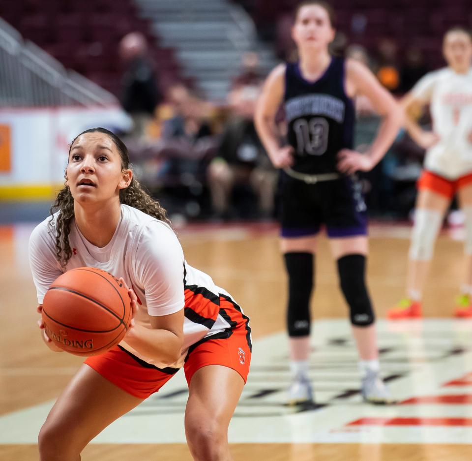 York Suburban's Janay Rissmiller lines up a free throw attempt during the District 3 Class 5A girls' basketball championship against Northern York at the Giant Center on March 1, 2024, in Hershey. The Trojans won in overtime, 37-35.