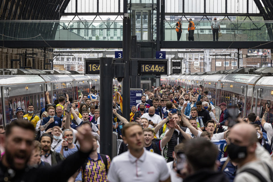 LONDON, ENGLAND - JUNE 17: Scotland fans arrive at King's Cross Station on June 17, 2021 in London, England. Officials in Scotland and London, where the match will be hosted at Wembley Stadium, have discouraged Scottish fans without tickets to the game of coming south, due to concerns about the spread of Covid-19. (Photo by Rob Pinney/Getty Images)