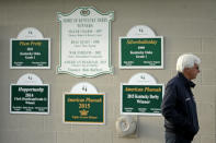 FILE - Trainer Bob Baffert stands outside his barn at Churchill Downs Monday, May 2, 2016, in Louisville, Ky. Baffert will miss the race for the third consecutive year. He served a two-year suspension by Churchill Downs Inc. after his 2021 winner Medina Spirit was disqualified for a failed drug test. But the track’s corporate ownership meted out an additional year of punishment. (AP Photo/Charlie Riedel, FIle)