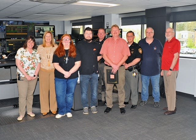 Officers from the Wayne County Sheriff’s Office and the Wayne County Commissioners recently visited the 911 dispatch center to present a proclamation recognizing dispatchers’ hard work and dedication during National Public Safety Telecommunicators Week.