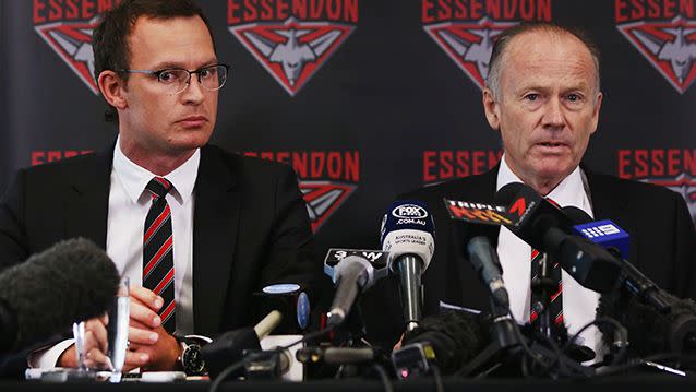 In the three-year ordeal, the Bombers have been banned from playing in the 2013 AFL finals series, they've had trade embargoes put in place, and their coach - James Hird - was exiled from the game for 12 months. Now they're planning a 2016 campaign with 12 of their top players suddenly unavailable. Pictured:  Essendon Bombers CEO Xavier Campbell (L) and Chairman Lindsay Tanner. Photo: Getty