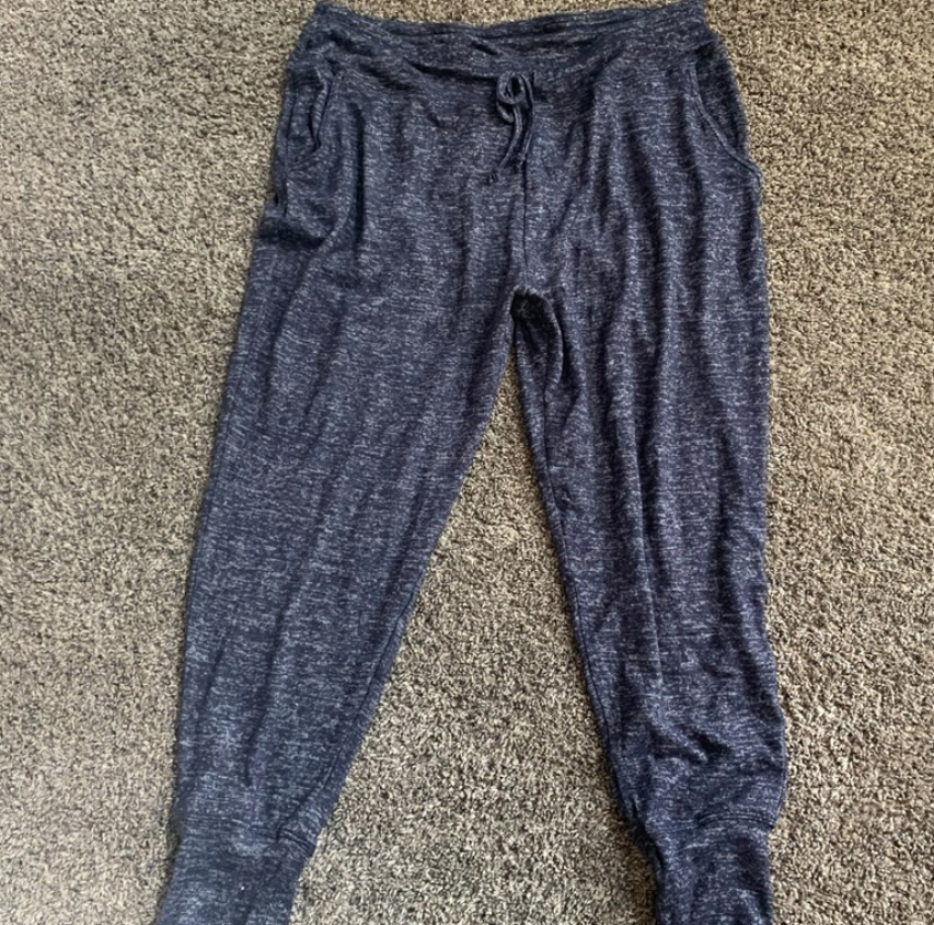 A pair of dark colored jogger pants.