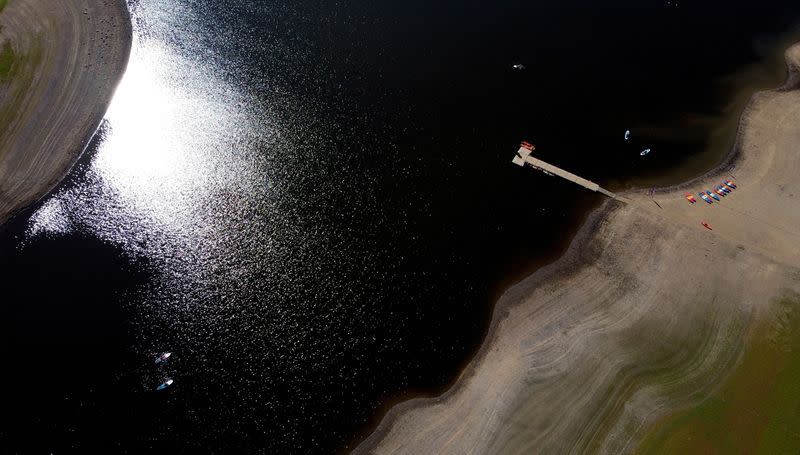 Paddle boarders can be seen on Tittesworth Reservoir, in Leek