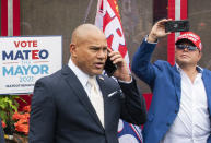 New York City mayoral candidate Fernando Mateo speaks on his mobile as he departs a campaign event where Michael Flynn, former national security adviser to former President Donald Trump, endorsed him on Thursday, June 3, 2021, in Staten Island, N.Y. (AP Photo/Eduardo Munoz Alvarez)