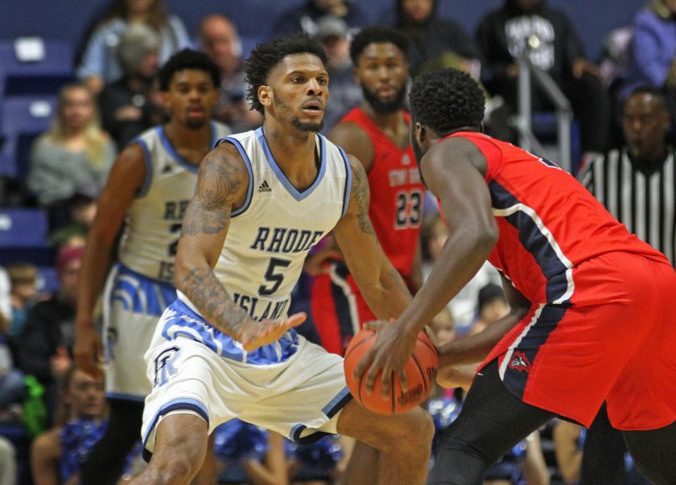 URI's Ryan Preston guards a Stony Brook player during a game on Nov. 24, 2018. Preston died earlier this week of injuries suffered in a car crash in Bahrain, where he was playing professional basketball.