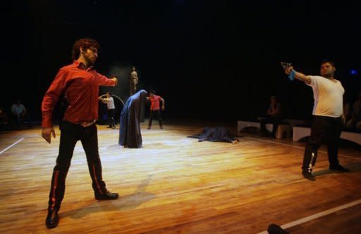 Actors from the Iraqi Theatre Company perform a scene from "Romeo and Juliet in Baghdad" during rehearsals for the World Shakespeare Festival. Romeo is Shiite, Juliet Sunni, and they must contend not only with warring families but a country torn by conflict and sectarian strife: this is the story of the play