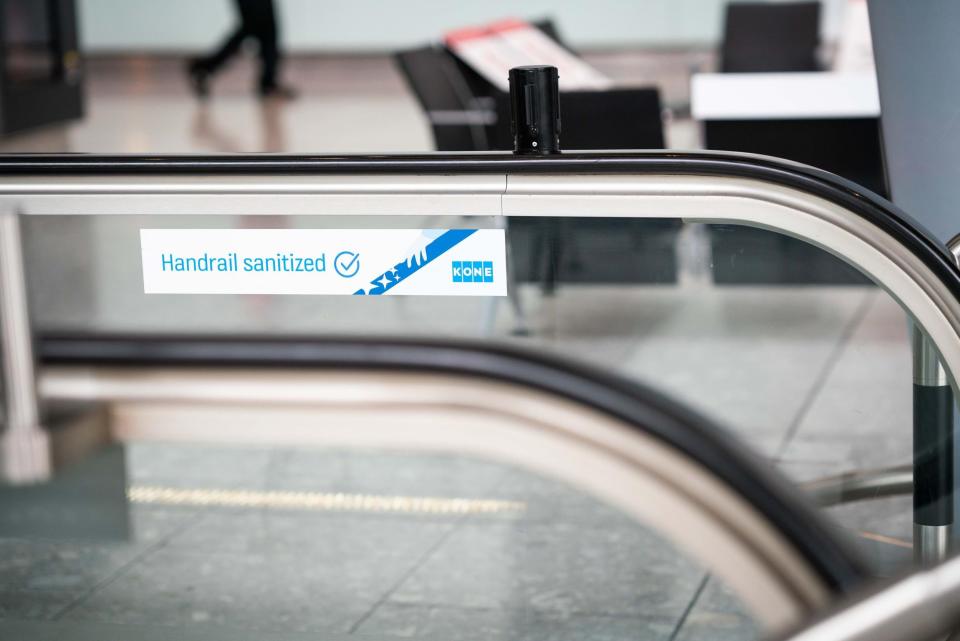 UV handrail cleaning technology on an escalator at Heathrow Airport (PA)