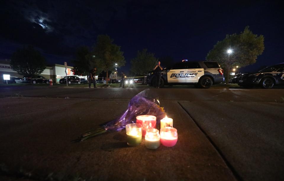 10 people were killed and three others injured in a shooting at a Buffalo, NY grocery store on May 14, 2022.  The 18-year-old from Conklin, NY allegedly shot people inside and outside of the Tops Friendly Market and was motivated by hate, authorities said.  11 of the 13 people shot were Black.  A bouquet of flowers with candles was left across the street from the Tops.