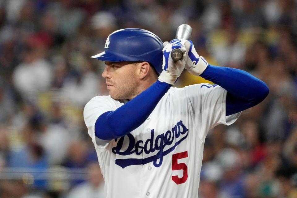 Los Angeles Dodgers first baseman Freddie Freeman bats during the first inning of a baseball game against the Atlanta Braves Thursday, Aug. 31, 2023, in Los Angeles. (AP Photo/Mark J. Terrill)